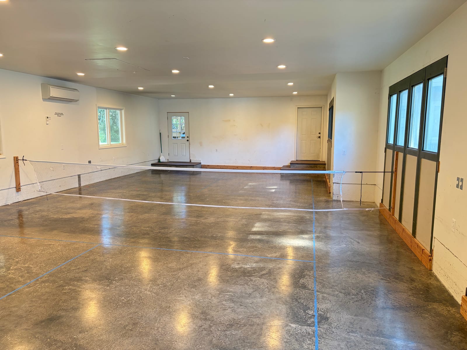 Indoor playroom with pickleball